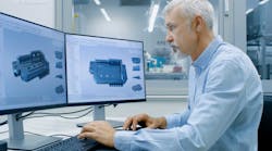 Person using CAD software Person using CAD software