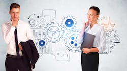 Engineers standing in front of gears sketch Engineers standing in front of gears sketch