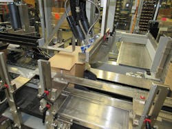 A Festo EGC for the Y axis and the ELCC for the Z-axis move the gluing system over the case flaps. A Festo EGC for the Y axis and the ELCC for the Z-axis move the gluing system over the case flaps.