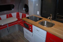 The interior follows 1950s styling but uses modern all-electrical appliances and AutomationDirect components to control lighting, heating/cooling and automatic load management. The interior follows 1950s styling but uses modern all-electrical appliances and AutomationDirect components to control lighting, heating/cooling and automatic load management.