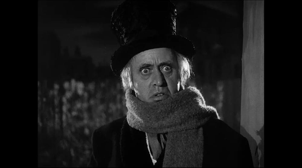 Alastair Sim as Ebenezer Scrooge