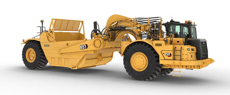 Cat 651 Wheel Tractor Scraper re-enters the market with upgrades to the powertrain, controls, hydraulics and structure.