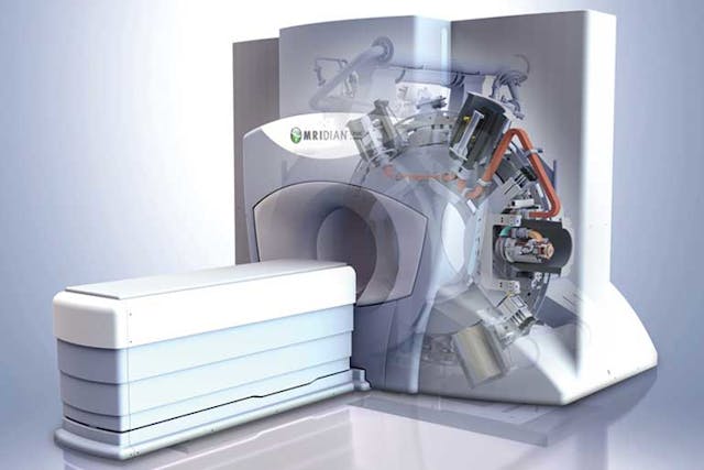 A machine for imaging, diagnosing, and treating cancer resembles an MRI machine, with patients being slid into a large toroid for treatment. This transparent view shows the circular gantry that positions the dosing and sensing elements.