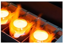 The crucible clips can be seen holding platinum crucibles over gas burners in one of Nieka’s sample-making machines. The clip’s design is relatively simple. But it took the company several DFMA steps to get to the final design. The crucible clips can be seen holding platinum crucibles over gas burners in one of Nieka’s sample-making machines. The clip’s design is relatively simple. But it took the company several DFMA steps to get to the final design.