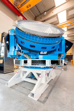 GESTRA’s gimballed antenna plate (silver disc) contains 256 phased-array radar transmitters and receivers and moves in 3 axes to track small objects (space junk) orbiting Earth. GESTRA’s gimballed antenna plate (silver disc) contains 256 phased-array radar transmitters and receivers and moves in 3 axes to track small objects (space junk) orbiting Earth.