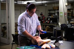 Bioengineering senior Reed Corum demonstrates his team’s laryngoscope on a manikin at Rice University’s Oshman Engineering Design Kitchen. Bioengineering senior Reed Corum demonstrates his team’s laryngoscope on a manikin at Rice University’s Oshman Engineering Design Kitchen.