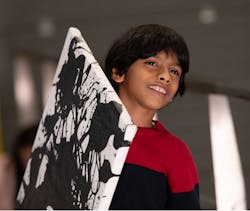 Advait Kolarkar with his artwork