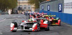 The Mahindra GEN 1 car goes into a hard right turn. The Mahindra GEN 1 car goes into a hard right turn.