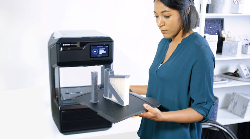 Woman 3D printing