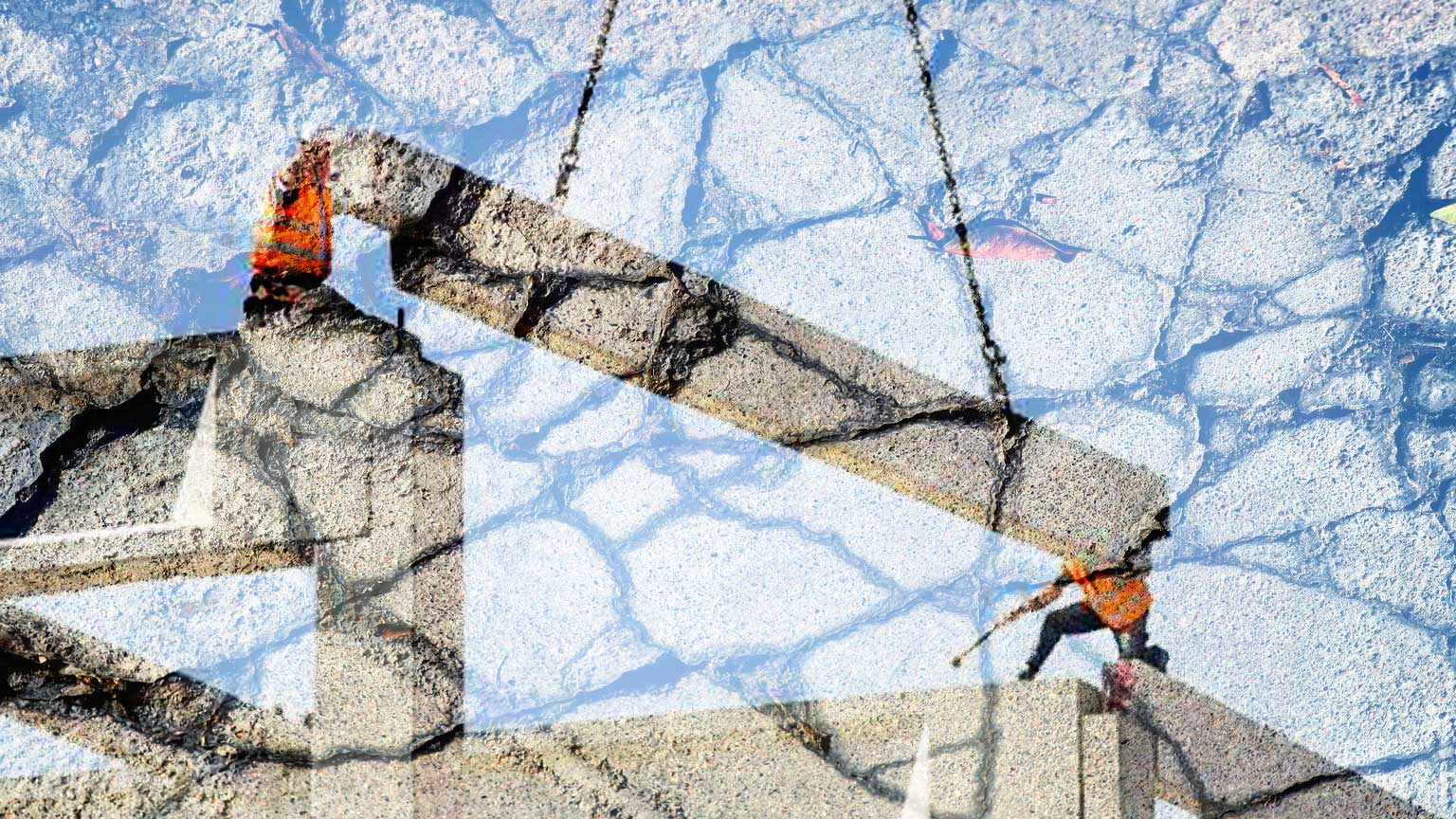Concrete beam being lowered