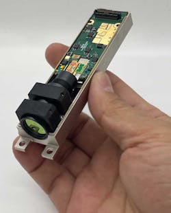 SiLC’s Eyeonic Vision Sensor integrates laser, optical circuitry and detectors into a single, silicon photonics chip (the orange-reddish chip in the center). SiLC’s Eyeonic Vision Sensor integrates laser, optical circuitry and detectors into a single, silicon photonics chip (the orange-reddish chip in the center).