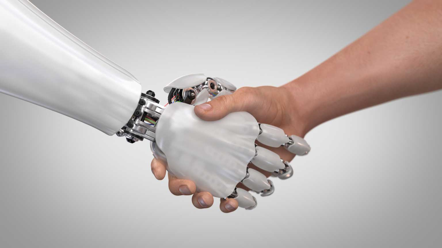 Robot shaking hands with a person