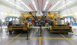 An Aerobotix robots similar to the ones used on the F-22 carry out maintenance on an F-35 using a process called Mold In Place (MIP). An Aerobotix robots similar to the ones used on the F-22 carry out maintenance on an F-35 using a process called Mold In Place (MIP).