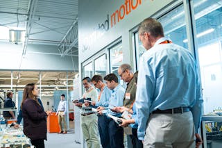 Nicole Lang, iglide product manager, igus, relays the properties of bearings and associated plastic technologies at a press tour of the igus facility in East Providence, R.I.