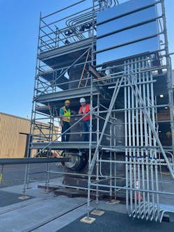 Technicians work on a working prototype of the SR2 reformer from Raven SR that converts methane to hydrogen. Technicians work on a working prototype of the SR2 reformer from Raven SR that converts methane to hydrogen.