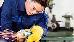 Worker in manufacturing plant Worker in manufacturing plant