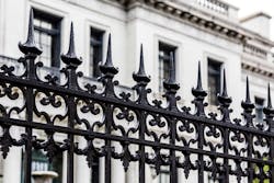 This wrought iron fence will not rust if it is painted and maintained. This wrought iron fence will not rust if it is painted and maintained.