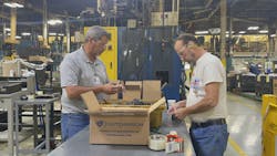 Darrell Cojocar, MMI job coach (left) and Curtis Carskadon, MMI employee (right). Darrell Cojocar, MMI job coach (left) and Curtis Carskadon, MMI employee (right).