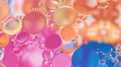 Oil mixed with water on a colored background Oil mixed with water on a colored background