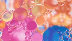 Oil mixed with water on a colored background Oil mixed with water on a colored background