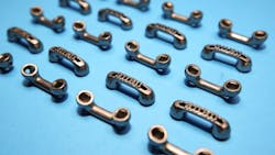 More than a cute charm, these miniature handsets show 3DEO’s proficiency when it comes to printing complex, functional geometric features. More than a cute charm, these miniature handsets show 3DEO’s proficiency when it comes to printing complex, functional geometric features.