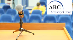 Microphone and podium with ARC logo
