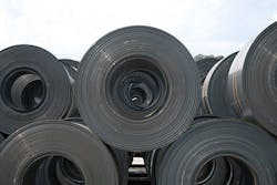 Stacks of hot rolled steel sheets.