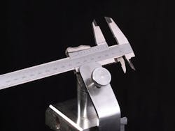 Metric Vernier calliper measuring device in a chrome plated holder