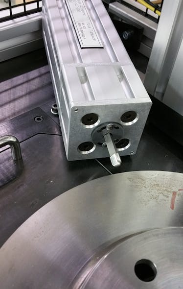 Cracks, flaws and other anomalies can be identified through frequency inspection. Here a force is applied to a brake rotor to measure its resonance frequency.