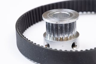 This timing belt and aluminum pulley are used in CNC machines for motion control.