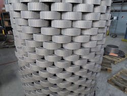 Transmission hubs are gas nitrided in stacks, which lets nitriding gases flow between parts to fully treat the surfaces. Parts are stacked as high as the vessel’s working volume will allow to maximize efficiency. Transmission hubs are gas nitrided in stacks, which lets nitriding gases flow between parts to fully treat the surfaces. Parts are stacked as high as the vessel’s working volume will allow to maximize efficiency.