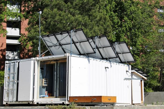 A 60-sq.-ft. chamber inside a shipping container can test passive systems that use wind towers along with water evaporation instead of electricity to cool spaces.