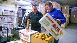 Heavy (52.5 lb/23.8 kg), two-piece boxes with slip top create palletizing challenges, as traditional vacuum grippers would pull the top off rather than lift the box. Heavy (52.5 lb/23.8 kg), two-piece boxes with slip top create palletizing challenges, as traditional vacuum grippers would pull the top off rather than lift the box.