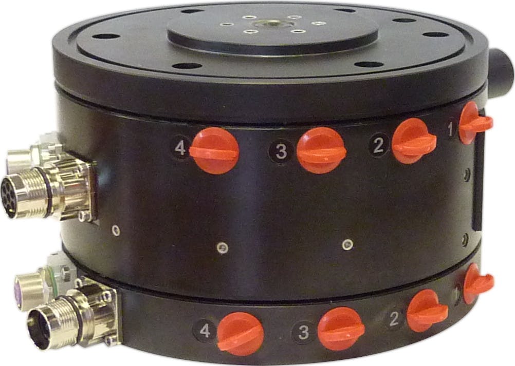An 8-channel pneumatic Moog Rotokombi consisting of a Rotopack rotary union and Rotoflux slip ring used between a robot arm and tool for rotations of more than 360 deg. and precision clamping.