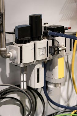 During an emergency stop, the compact Festo air preparation system will evacuate compressed air with a soft start/quick exhaust valve but keep vacuum so that whatever is being held remains in control and isn’t dropped. During an emergency stop, the compact Festo air preparation system will evacuate compressed air with a soft start/quick exhaust valve but keep vacuum so that whatever is being held remains in control and isn’t dropped.