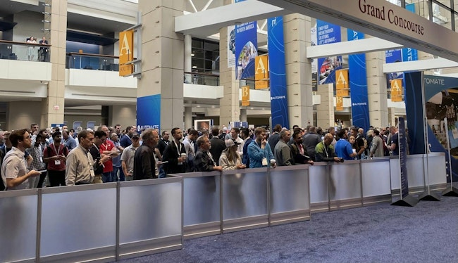 Attendees begin to gather at the entrance of the exhibit hall at Automate 2024 in Chicago, May 6-9.