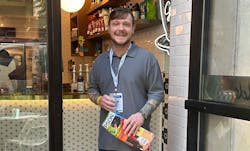 Christopher Thrasher, engineering welding technician, A.O. Smith Corporation, Johnson City, Tenn., appreciates the value of having an AGV helping with heavy lifting. Christopher Thrasher, engineering welding technician, A.O. Smith Corporation, Johnson City, Tenn., appreciates the value of having an AGV helping with heavy lifting.