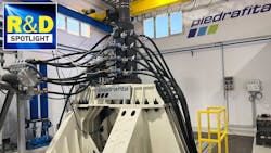 A custom-designed test bench developed by Moog and Piedrafita Systems simulates the movement of a hydraulic vehicle’s tracks over uneven terrain. The system incorporates hydraulic actuators with digital servo valves, a test controller, power cabinet, digital pumps and an accumulator bench with piping. A custom-designed test bench developed by Moog and Piedrafita Systems simulates the movement of a hydraulic vehicle’s tracks over uneven terrain. The system incorporates hydraulic actuators with digital servo valves, a test controller, power cabinet, digital pumps and an accumulator bench with piping.