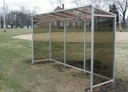 Figure 3. Shown right after installation, this baseball dugout is constructed of four-slotted smooth aluminum extrusion with plastic protective paneling, plus orange and black T-slot covers. Image courtesy of 80/20. Figure 3. Shown right after installation, this baseball dugout is constructed of four-slotted smooth aluminum extrusion with plastic protective paneling, plus orange and black T-slot covers. Image courtesy of 80/20.