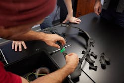 A team of engineering experts created a custom 3D-printed harness that would securely attach sufficient weight while comfortably fitting Charlotte's unique shell geometry. A team of engineering experts created a custom 3D-printed harness that would securely attach sufficient weight while comfortably fitting Charlotte's unique shell geometry.
