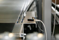 Mini-rectangular plastic, retroreflective photoelectric sensors from AutomationDirect have reliable sensing ranges of 4 m, making them a good fit for detecting the presence of boxes on a conveyor. Mini-rectangular plastic, retroreflective photoelectric sensors from AutomationDirect have reliable sensing ranges of 4 m, making them a good fit for detecting the presence of boxes on a conveyor.