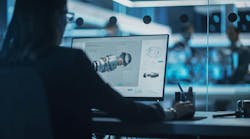 Industrial engineer working on CAD software Industrial engineer working on CAD software