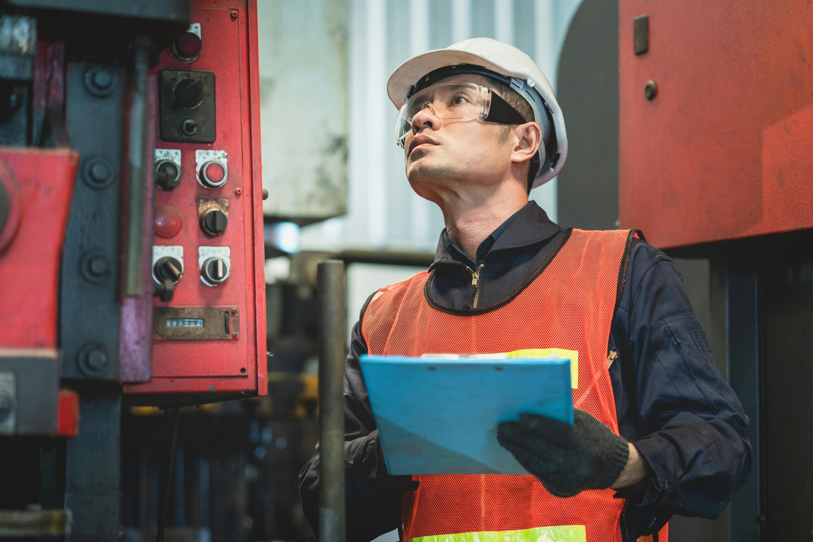 Engineer inspecting equipment