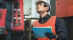 Engineer inspecting equipment Engineer inspecting equipment