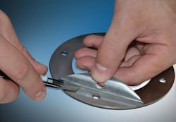 It takes a tool to remove individual layers from surface-bonded laminated shims and adjust their thickness. It takes a tool to remove individual layers from surface-bonded laminated shims and adjust their thickness.