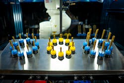 Handling cannabis pre-rolls, or joints, to coat them with powdery kief or infuse them with oils or waxes is a difficult process to perform manually. Using robots to perform these tasks helps prevent contamination, which is a primary concern in cannabis production. Handling cannabis pre-rolls, or joints, to coat them with powdery kief or infuse them with oils or waxes is a difficult process to perform manually. Using robots to perform these tasks helps prevent contamination, which is a primary concern in cannabis production.