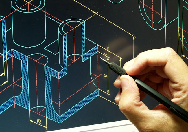 Engineer working on CAD blueprint