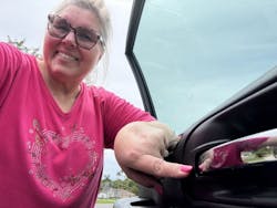 Sharon Spielman replacing a door handle assembly Sharon Spielman replacing a door handle assembly