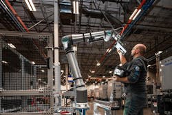 Employee with cobot Employee with cobot