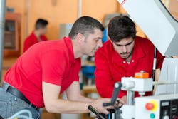 Workers on manufacturing floor Workers on manufacturing floor